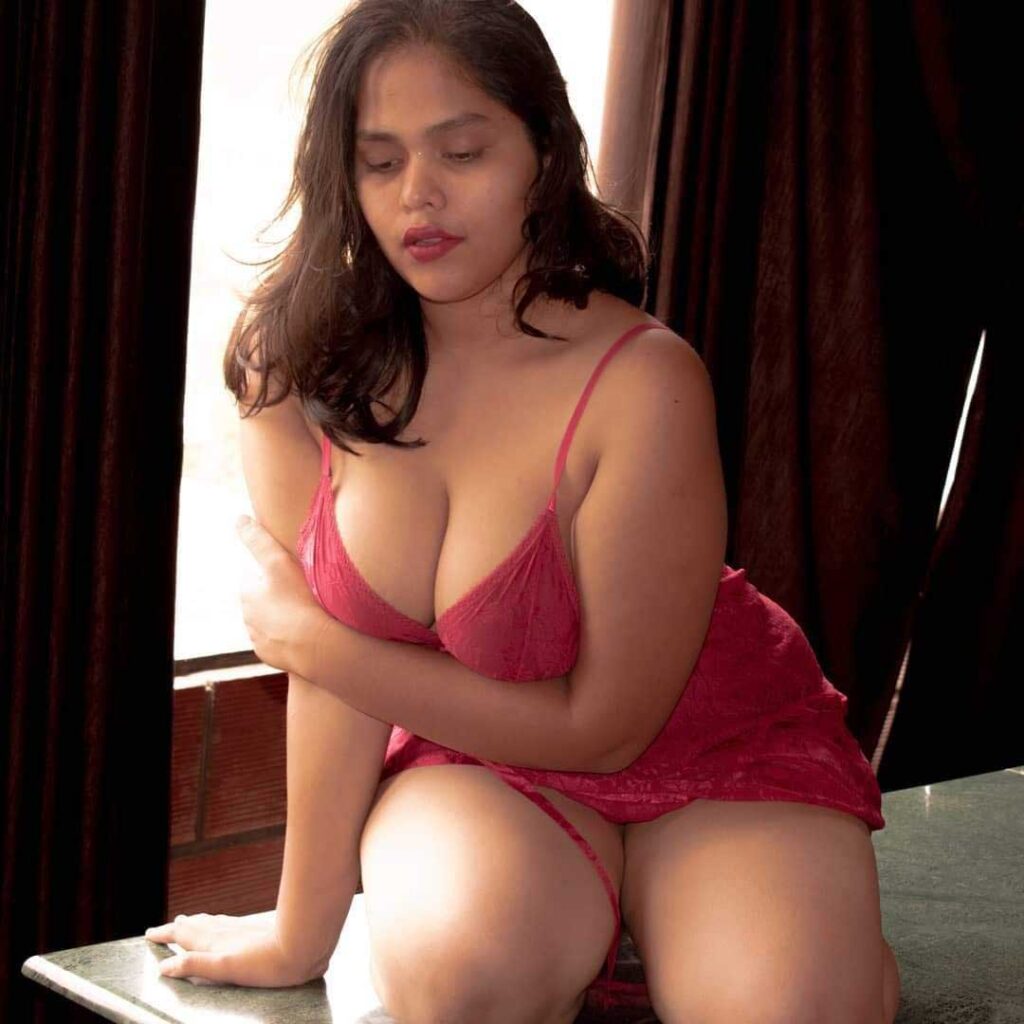 sexy Bandra call girl in red nighty, revealing her big boobs