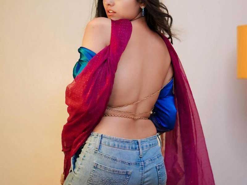 a girl posing backless