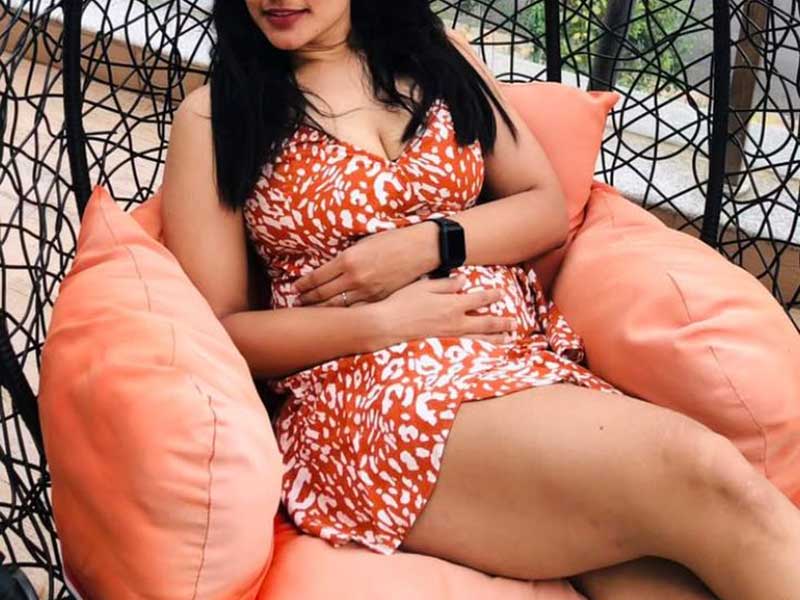 a girl in red short skirt in a relaxed mood