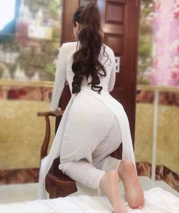 sexy call girl in white suit showing her sexy butt