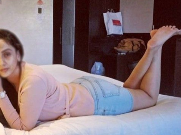 cute and pretty babe lying in bed